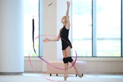 Кристина Войтенко во время упражнения с лентой