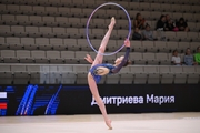 Мария Дмитриева во время упражнения с обручем