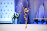 Гимнастка во время упражнения с обручем на всероссийском турнире «Кубок "Небесная грация"»