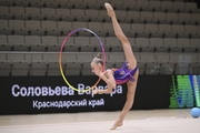 Варвара Соловьева во время упражнения с обручем