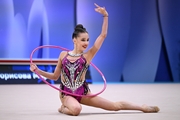 Мария Борисова во время выполнения упражнения с обручем на всероссийском турнире «Кубок "Небесная грация"»