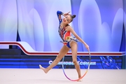 Ксения Савинова во время выполнения упражнения с обручем на всероссийском турнире «Кубок "Небесная грация"»