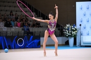 Мария Борисова во время выполнения упражнения с обручем на всероссийском турнире «Кубок "Небесная грация"»