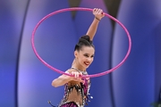 Мария Борисова во время выполнения упражнения с обручем на всероссийском турнире «Кубок "Небесная грация"»