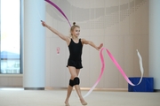 Кристина Войтенко во время упражнения с лентой