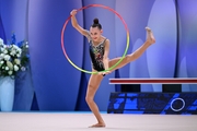 Полина Семенова во время выполнения упражнения с обручем на всероссийском турнире «Кубок "Небесная грация"»